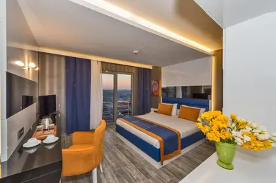 a hotel room with a bed and a desk at Inntel Hotel Istanbul in Istanbul