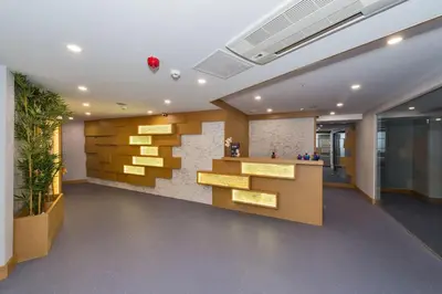 an office with a lobby with a reception desk and a wall at Hotel Boursier 1 & Spa in Istanbul