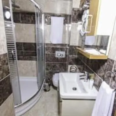 a bathroom with a shower and a sink at mars hotel in Istanbul