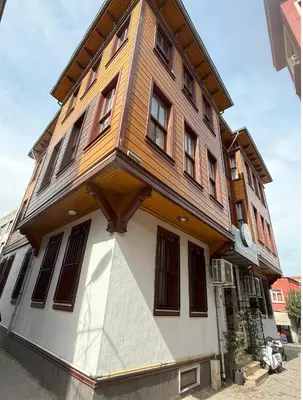 a building with a gambrel roof on top of it at Grand Bedir in Istanbul