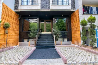 a building with a staircase leading to the front door at AG Hotel & Residence Şişli in Istanbul