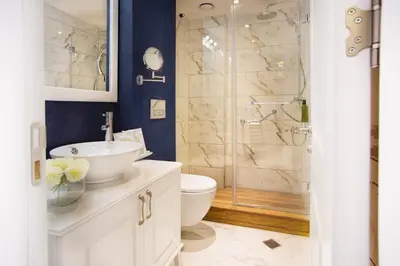 a bathroom with a shower and a sink and a toilet at Astan Hotel Taksim in Istanbul