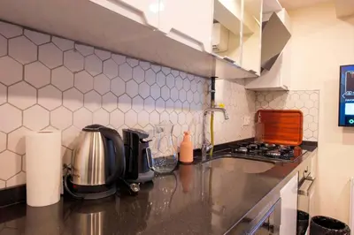 a kitchen with a sink and a counter top at Mar Residence in Istanbul