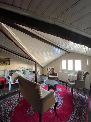 a room with a tent with chairs and a table at Roza's Istanbul Homestay in Istanbul