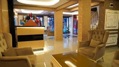 a living room with two chairs and a fireplace at Hotel FORTYNİNE in Istanbul