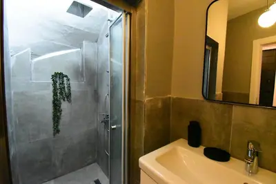a bathroom with a shower and a sink at Stunning Apt Near Metro - YM 2 in Istanbul