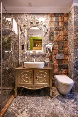 a bathroom with a sink and a mirror at Emerald Mansion Hotel in Istanbul