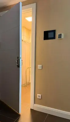 an open door to a room with a hallway at Nidya Hotel Esenyurt in Istanbul