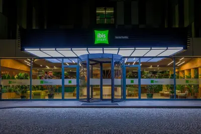 a bus stop in front of a building at night at ibis Styles Istanbul Kurtkoy in Istanbul