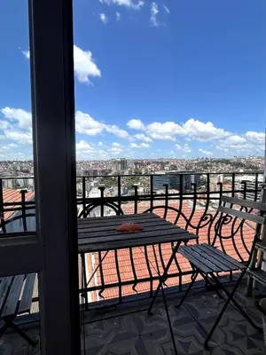 a table and chairs on a balcony with a view at 3BR,Charming Flat,Golden Horn View in Istanbul