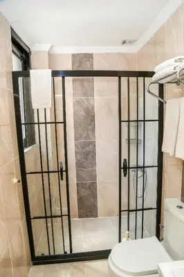 a bathroom with a shower with a toilet at ASİTANE life HOTEL in Istanbul