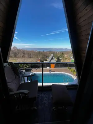 a view of a pool from a room with a window at DREAM DELUXE SAPANCa in Sapanca