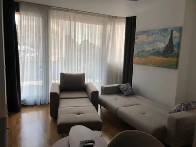 a living room with a couch and a chair at Safir Suite in Istanbul