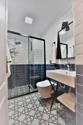 a bathroom with a shower and a sink and a toilet at A spacious 3 rooms duplex close to İstiklal Boulevard in Istanbul