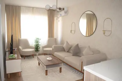 a living room with a couch and a mirror at Luxe Suite AY38 in Eskiömerler