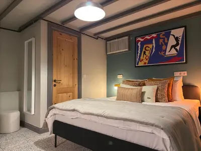 a bedroom with a large bed in a room at Stunning Private House in Balat in Istanbul