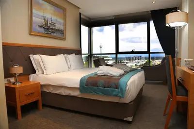 a hotel room with a bed with a large window at Le Marde Hotel in Istanbul