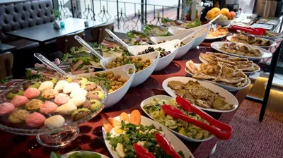 a buffet with many plates of food on a table at Grand Ambiance Hotel in Istanbul