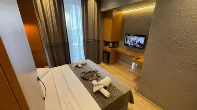 a room with a bed with two towels on it at Grand Ambiance Hotel in Istanbul