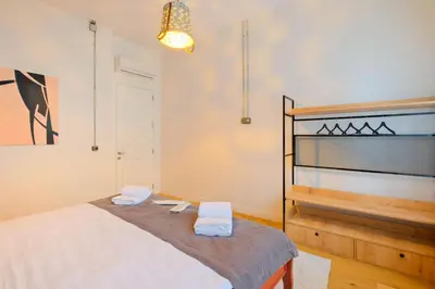 a bedroom with a bed with two towels on it at Casa Isabel - Amazing 5Br House in Prime Location in Istanbul