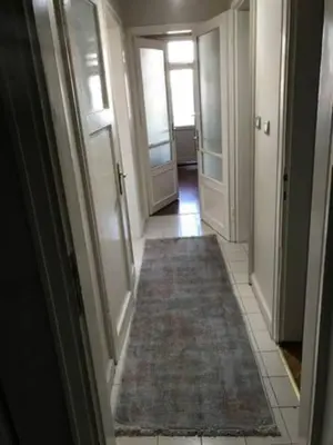 a hallway with a rug on the floor of a room at Bosphorus view, Great location and Cozy House! in Istanbul