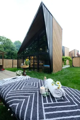 a picnic table with towels and flowers on a blanket at Backyard Sapanca in Sapanca