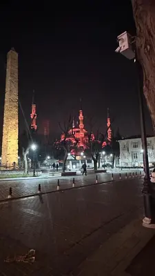 a lit up city at night with red lights at Golden Wood Suites in Istanbul