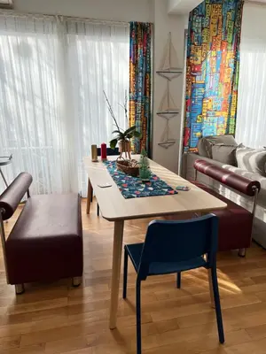a dining room with a table and a couch at Central Apartment Close to Galataport in Istanbul