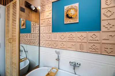a bathroom with a toilet and a sink and a tub at Rum Otto Enjoy Relax 30 sec to Taksim Bathtub in Istanbul