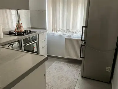 a kitchen with a refrigerator and a stove at Three-room private apartment in Beyoğlu, Central Istanbul in Istanbul
