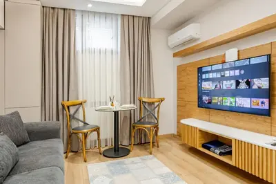 a living room with a couch and a table at Chido Residence in Istanbul