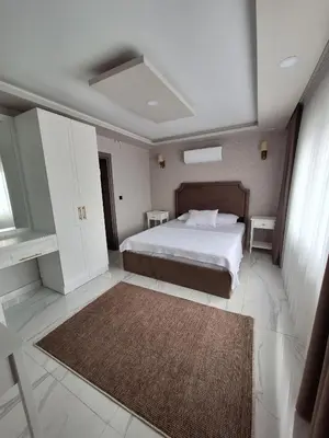 a bedroom with a large bed and a large window at Daly Resort 1 in Sapanca