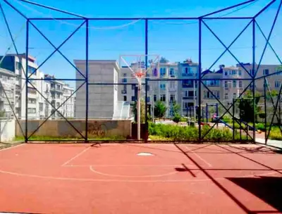 an empty basketball court with a basketball hoop at A million dollar view of the Bosporus and balcony in Istanbul