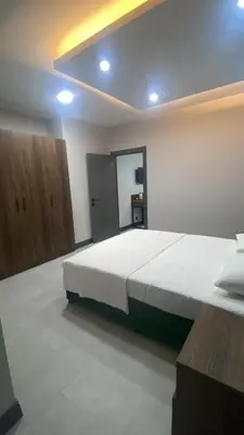 a bedroom with a large bed in a room at Trio Palace in Istanbul