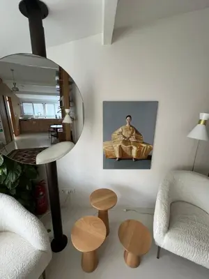a living room with a table and a mirror at Lobby No23 in Istanbul