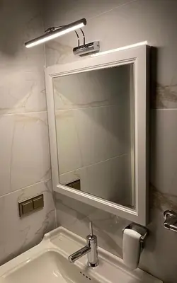 a bathroom with a sink with a mirror and a sink at Ozkaya Apartments Galata in Istanbul