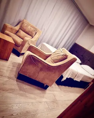 a pile of blankets on the floor of a room at The my hotel darica in Darıca