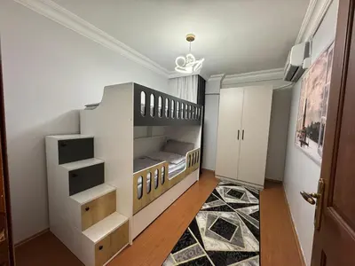 a bedroom with a bunk bed in a room at شقه الأحلام بمنطقة شيشلى ثلاث غرف وصالون in Istanbul