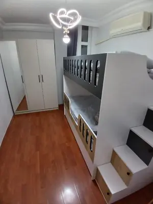a bedroom with a bunk bed in a room at Luxurious apartment in Sisli area, three rooms and a living room in Istanbul