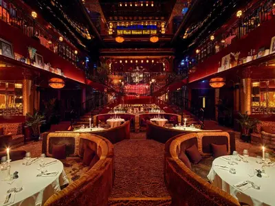 a restaurant with tables and chairs in a room at Aliée Istanbul - A Paris Society Collection Hotel in Istanbul