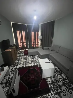 a living room with a couch and a table at Murat bey konağı in Istanbul