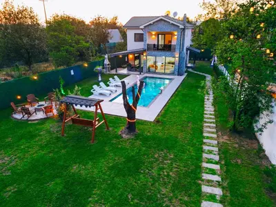 an aerial view of a house with a swimming pool at Villove Sapanca in Sapanca