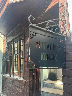 a sign on the side of a building at Murat bey konağı in Istanbul