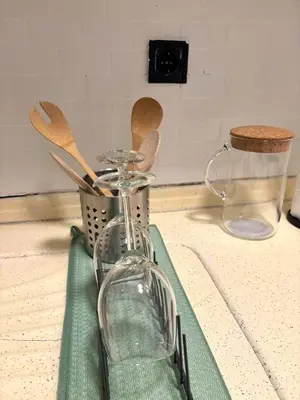 a glass blender sitting on top of a green towel at Pink House - Central Location by Seashore, Fiber Internet in Istanbul
