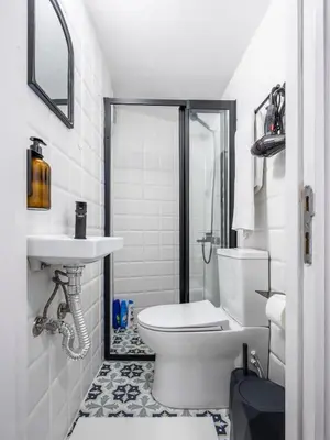 a bathroom with a toilet and a sink at Galata Hidden Apartments in Istanbul