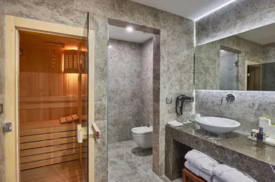 a bathroom with a sink and a toilet at Renata Boutique Hotel Sisli in Istanbul