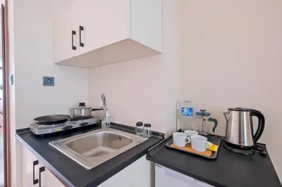 a kitchen with a sink and a counter top at Casa Nozze 3 in Istanbul