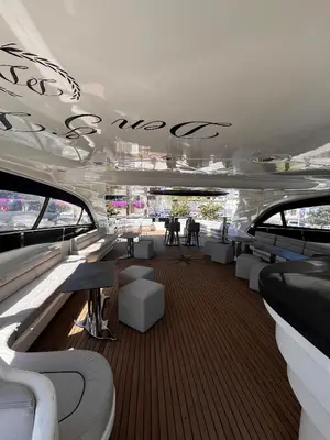 a large room with tables and chairs on a boat at Den Den İstanbul in Istanbul