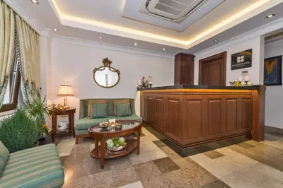 a living room with a couch and a table at Four Doors Hotel in Istanbul
