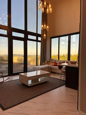 a living room with a couch and a table at Loft Sabırlı in Kaynarca